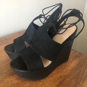 Black tie around the ankle wedges